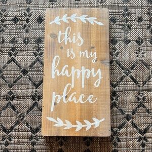 Wooden Sign with White Text